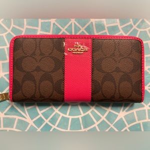 NWOT Coach Signature Canvas Slim accordion zip wallet.